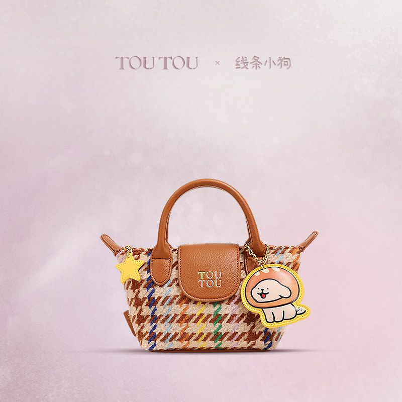 「TOUTOU xライン子犬」は犬餃子バッグを修理します