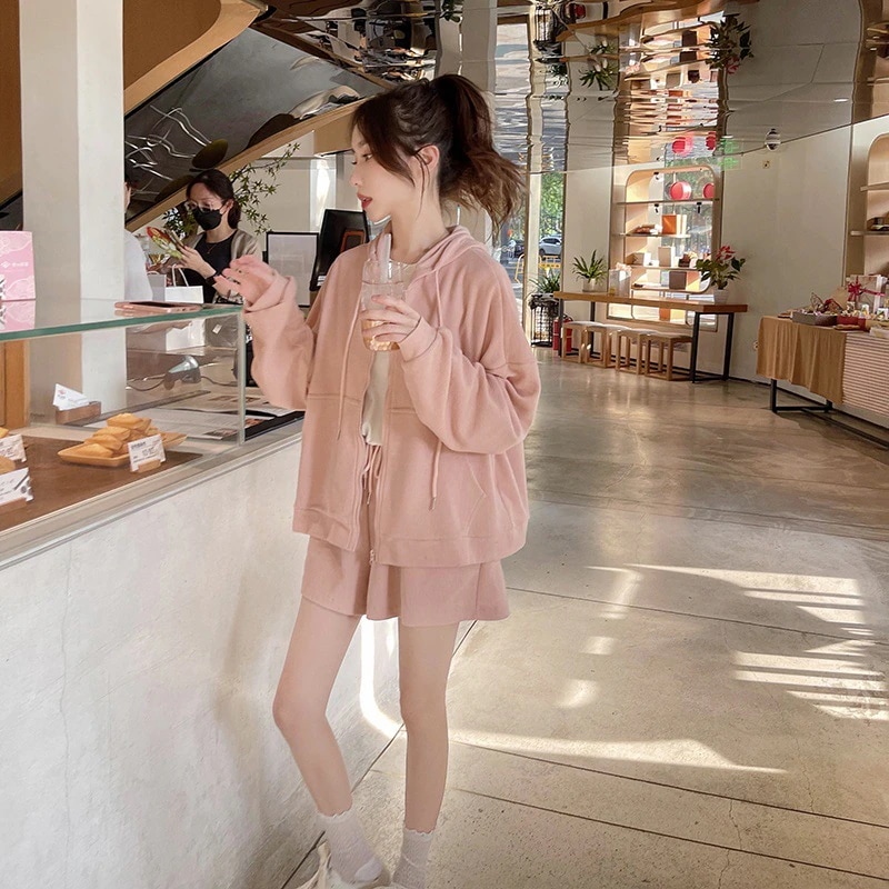 2024 今年人気のピンクのフード付きトレーナーセット女性秋フレンチミルク甘い緩い汎用性の高いツーピースセット 5,589円