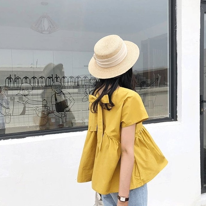 トップス シャツ 白シャツ ミディアム丈 袖あり 半袖 ラウンドネック 襟なし 切り替えデザイン リボン バックリボン 薄手 かわいい 大人可愛い きれいめ シンプル 上品 おしゃれ アジアン 4,932円