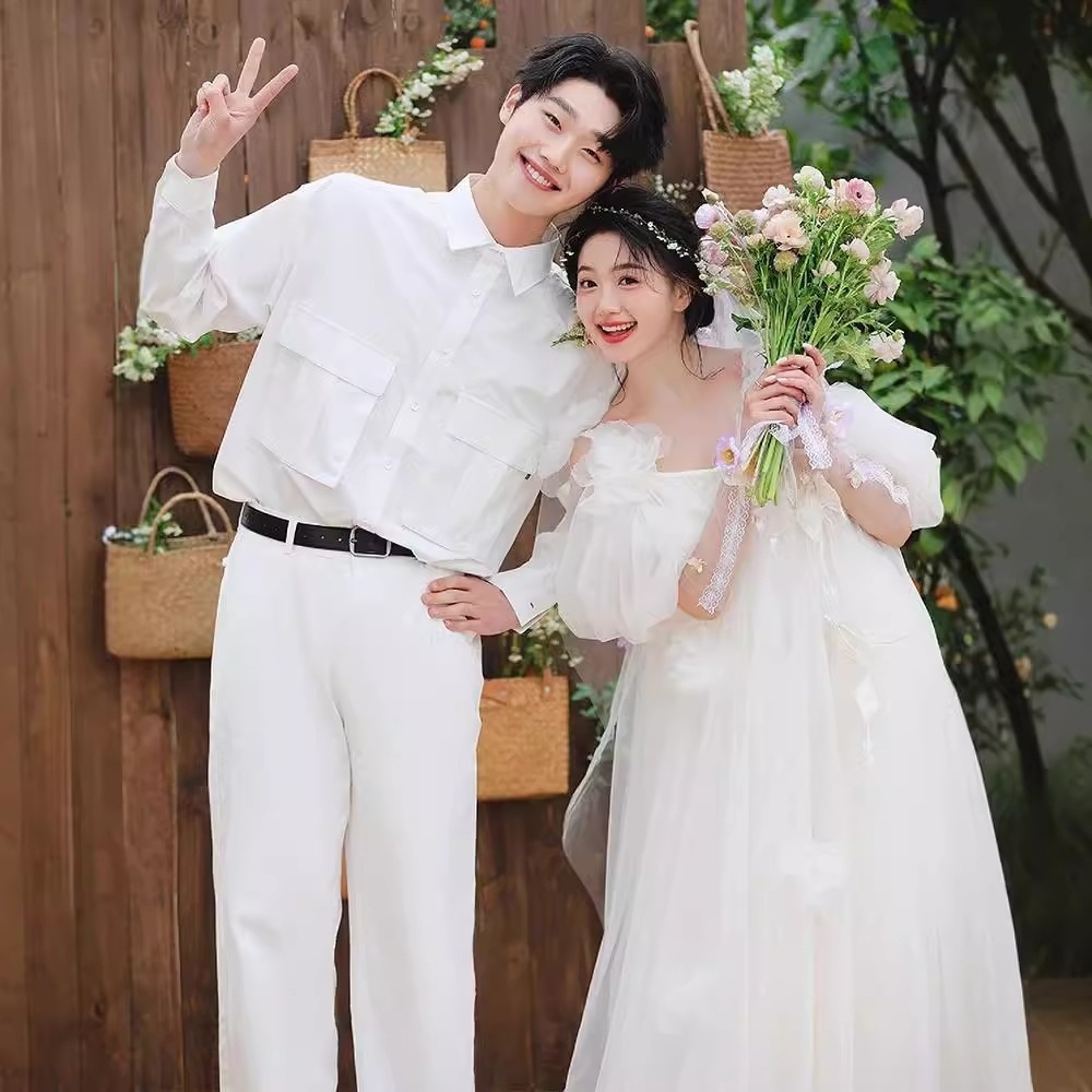 アンドロメダ森系軽ウェディングドレス小衆花嫁朝衣が出て行ったベールロケ地の迎賓軽紗影楼屋外旅行でドレスを撮る