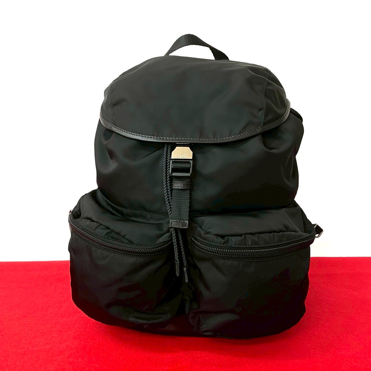 三角ロゴ 金具リュックサック ナイロン レザー ブラック 27439