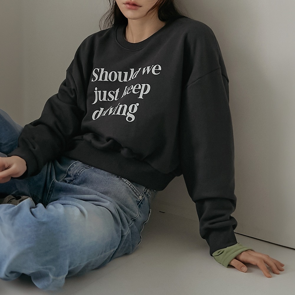 英文プリント入りスウェットシャツ