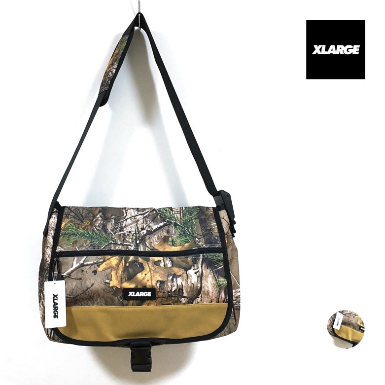 XLARGE エクストララージ POSTMAN SHOULDER BAG ショルダー バッグ ユニセックス 送料無料 総柄 鞄 カバン ストリート系