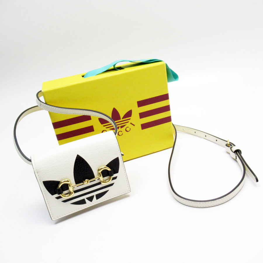 グッチ GUCCI 二つ折り財布 ショルダーウォレット x adidas レザー オフホワイト/ブラック ゴールド ユニセックス 702248 w0866a