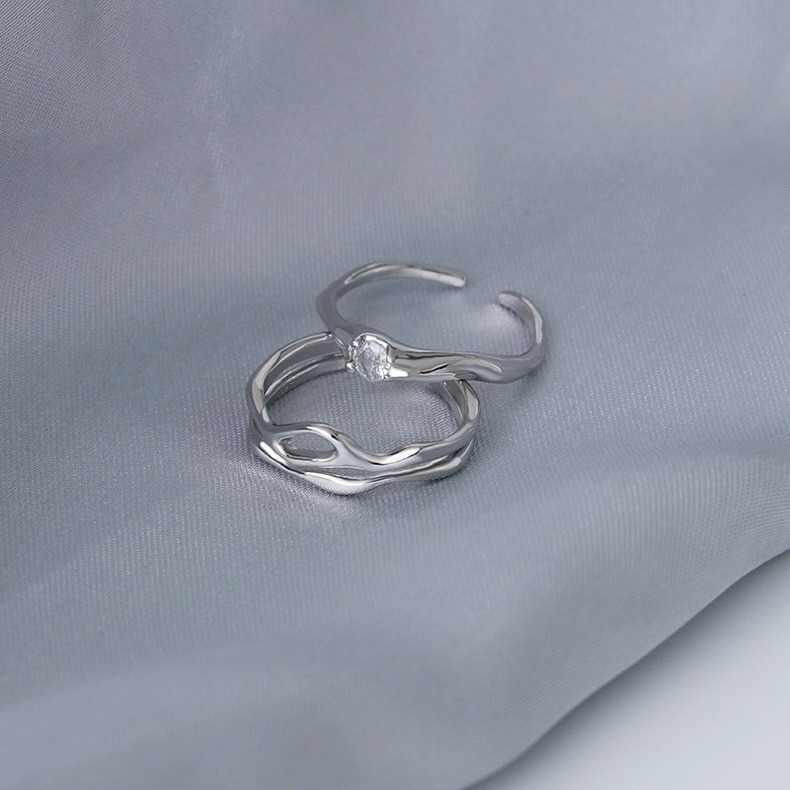 【1点ご購入 で10点プレゼントいたします】足銀のカップルリング冷たい風男女のペアリング不規則高級開口指輪