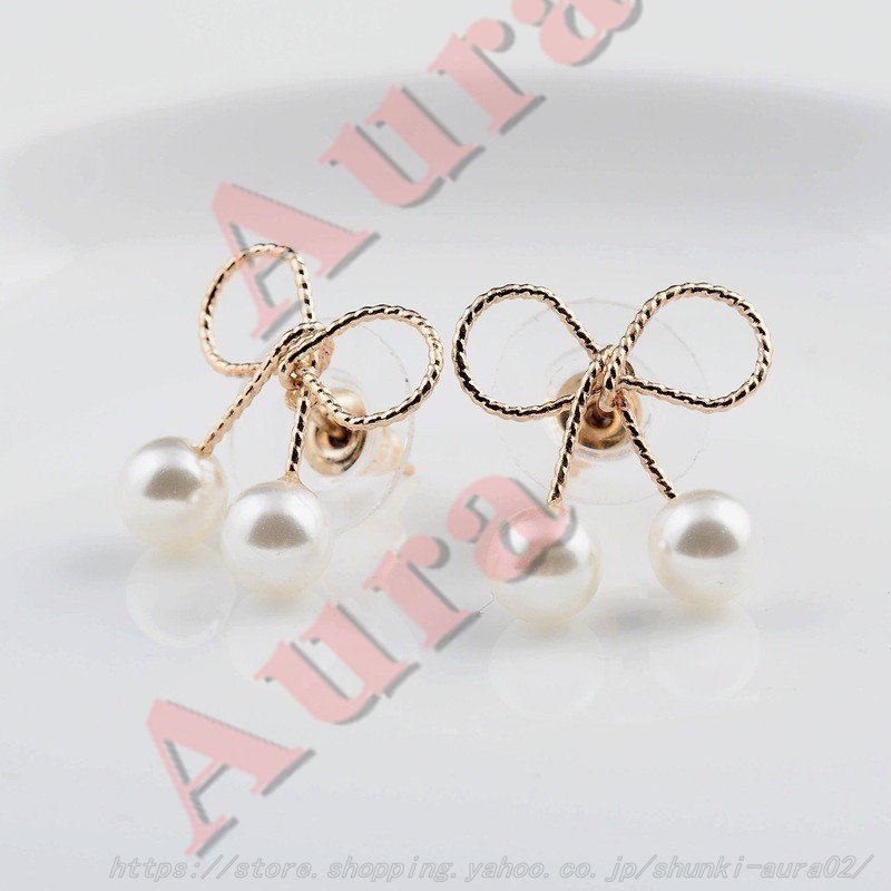 ピアス フェイクパール リボンモチーフ かわいい シンプル 綺麗め おしゃれ アクセサリー デート イヤリング 通販 Vivalafocaccia Com