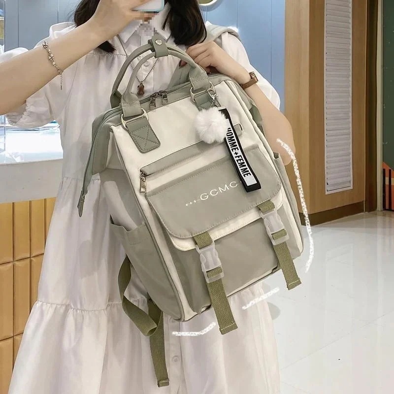 新型カバン女子学生ins風韓国版中学生森系百合衝突色リュックサック旅行ランドセル