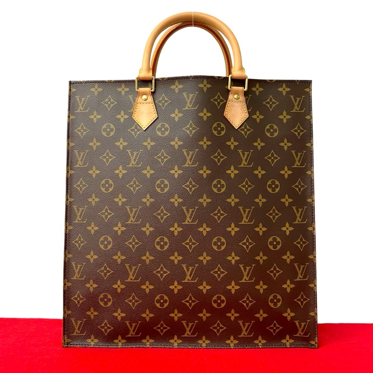 サックプラ モノグラムトートバッグ レザー PVC ブラウン 26977 104,335円