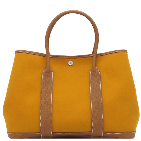 エルメス HERMES トートバッグ ガーデンパーティーPM トワルオフィシエ ネゴンダ サフラン×ゴールド シルバー金具 茶 C刻印 【保存袋】【中古】 189,520円