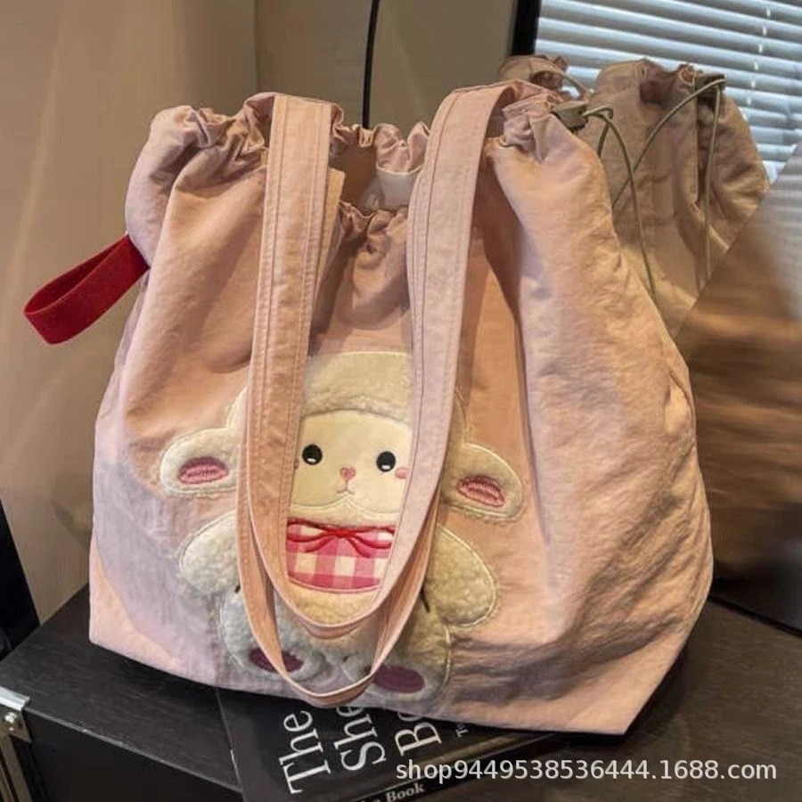 【20点セット】【送料無料】大容量トートバッグ女性2025かわいい小羊の帆バッグ学生通勤用ショルダーバッグ