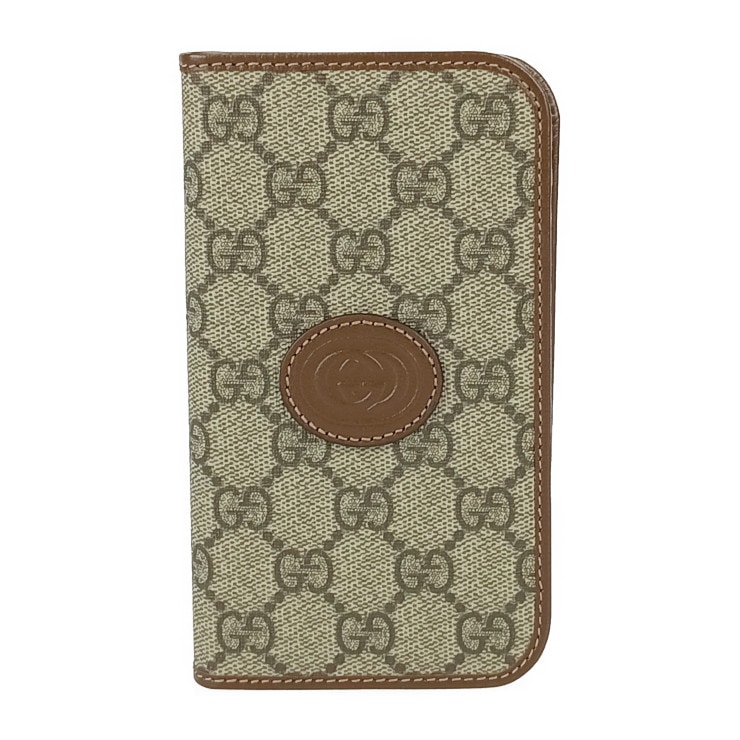 新品未使用展示品 GUCCI グッチ スマホカバー インターロッキングG iPhone15 フォリオ 760184 ベージュ＆エボニー GGスプリームキャンバス レザー 手帳型【本物保証】