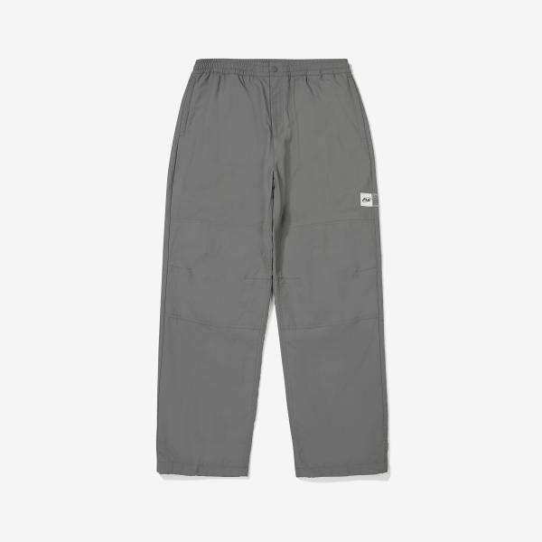 FILA アシンメトリーフリース裏地ウーブンパンツ