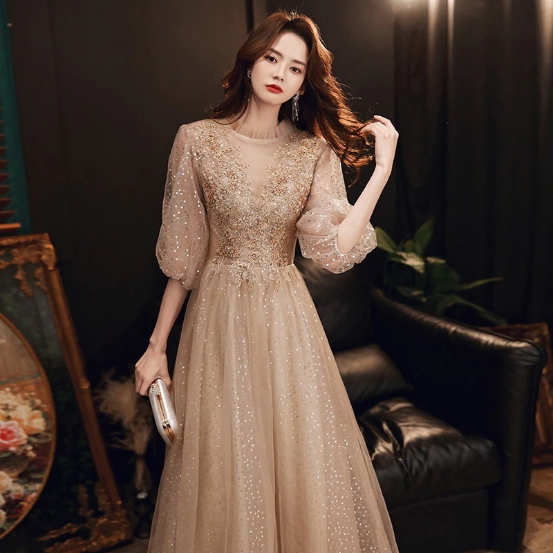 シャンパンカラーのイブニングドレス女性2024宴会気質ブライズメイド学生パフォーマンスロングドレス 5,669円