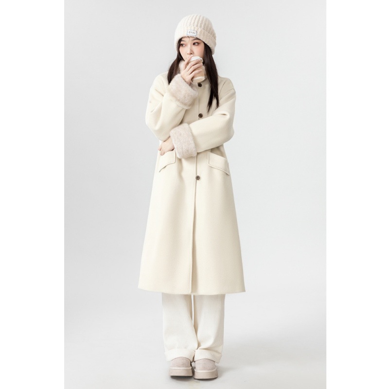 冬の新型米白色毛ですねコートの女性ファッション感がシンプルで毛羽立ちを厚くしたコートの上着です