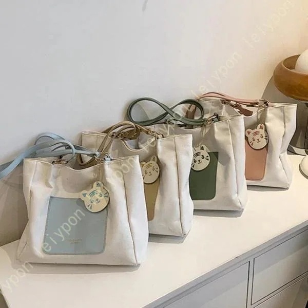 【送料無料】SNSの話題ショルダーバッグ レディース おしゃれ かわいい 韓国ファッション 大きめ 通勤 通学 キャンバス生地 肩掛け トートバック