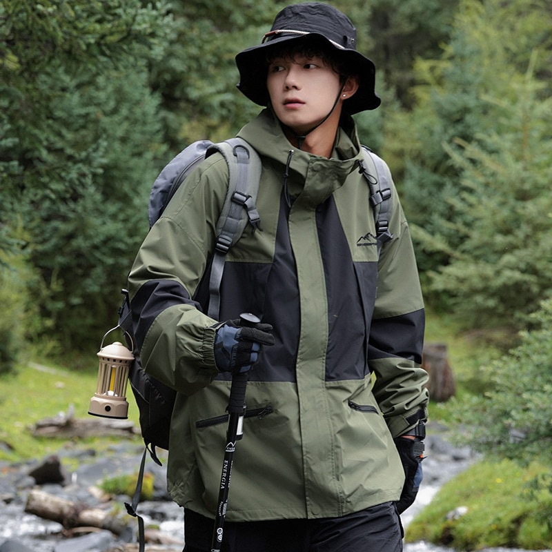 アウトドア三防科学技術突撃衣男女衝突色接合突撃ジャケット防水防風カップルが登山服を隠す
