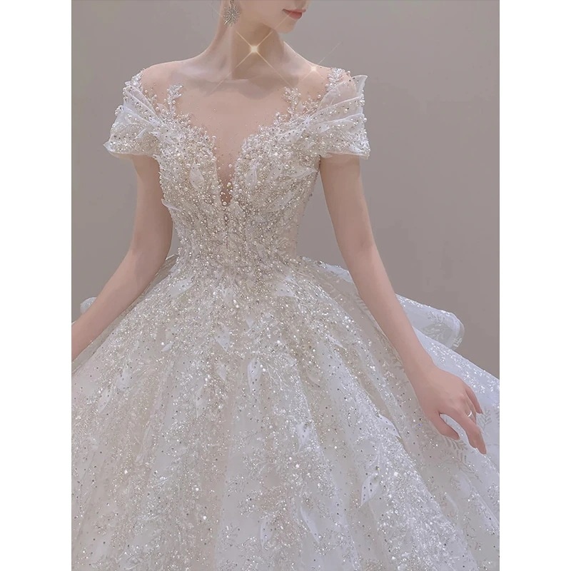 軽いウェディングドレス ブライダル 2025 ワンショルダー レトロ 重工業 感溢れる上質な質感 リトルアウタードレス