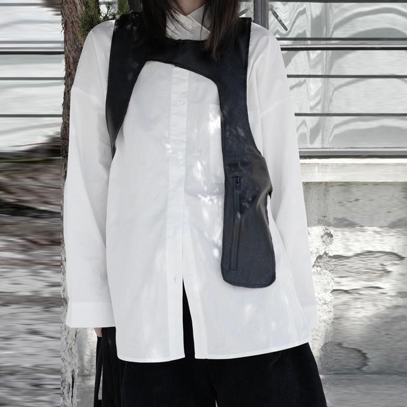 レディースルーズバージョンブラックイレギュラーベストベスト新しいVネックノースリーブファッショントレンドレディースベストパーソナリティ婦人服