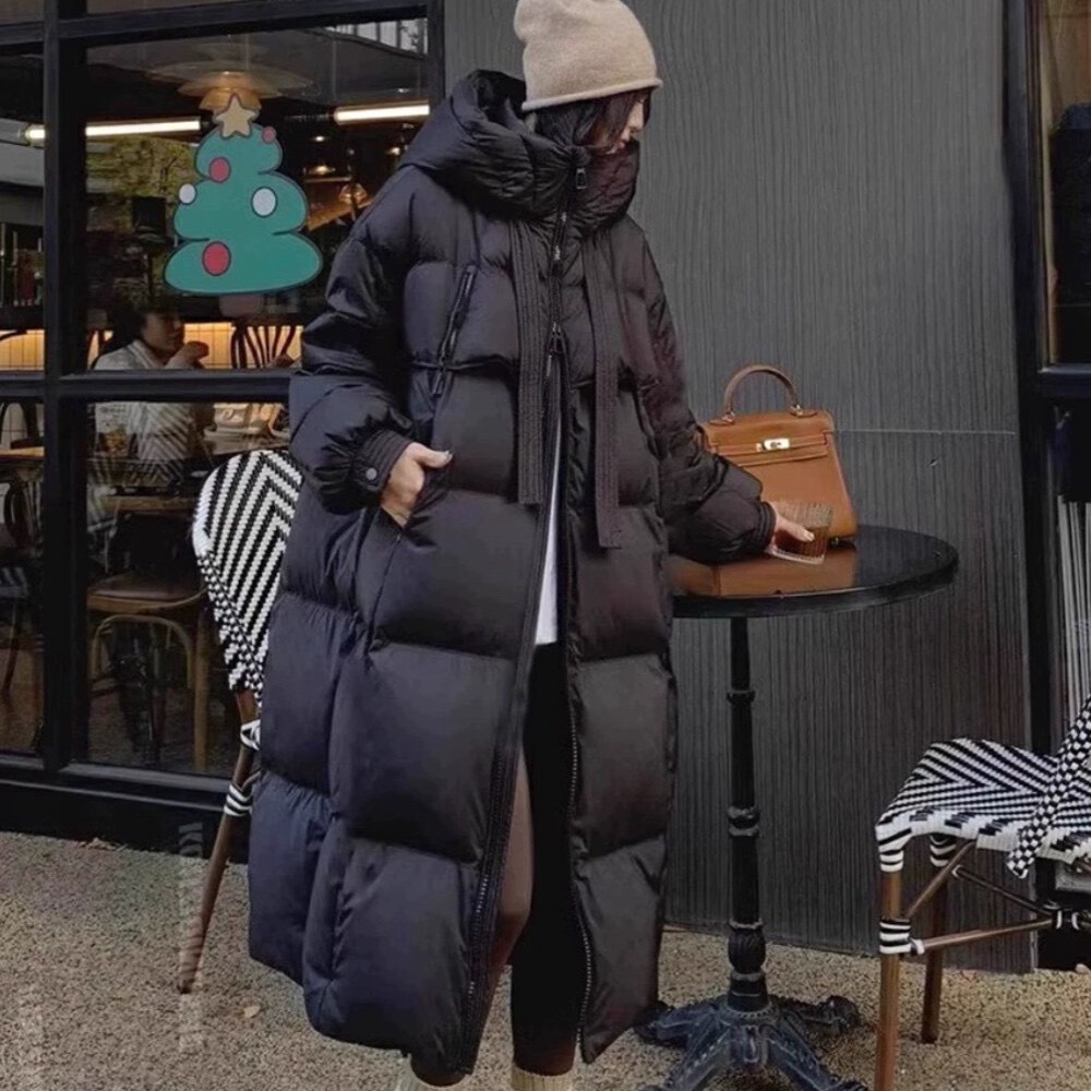 2025 冬の新ヨーロッパスタイルリボンミッドレングスダウンジャケット女性のルース厚いホワイトダックダウン膝上暖かいジャケット