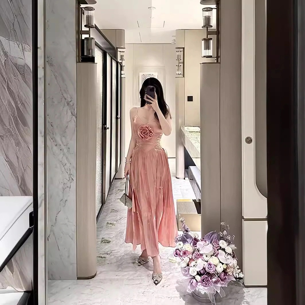 【2枚購入で 3oo円OFF！】オレンジピンクサスペンダー立体フラワープリーツドレスロングスカート女性用軽い大人プリーツバックレスホリデースカート