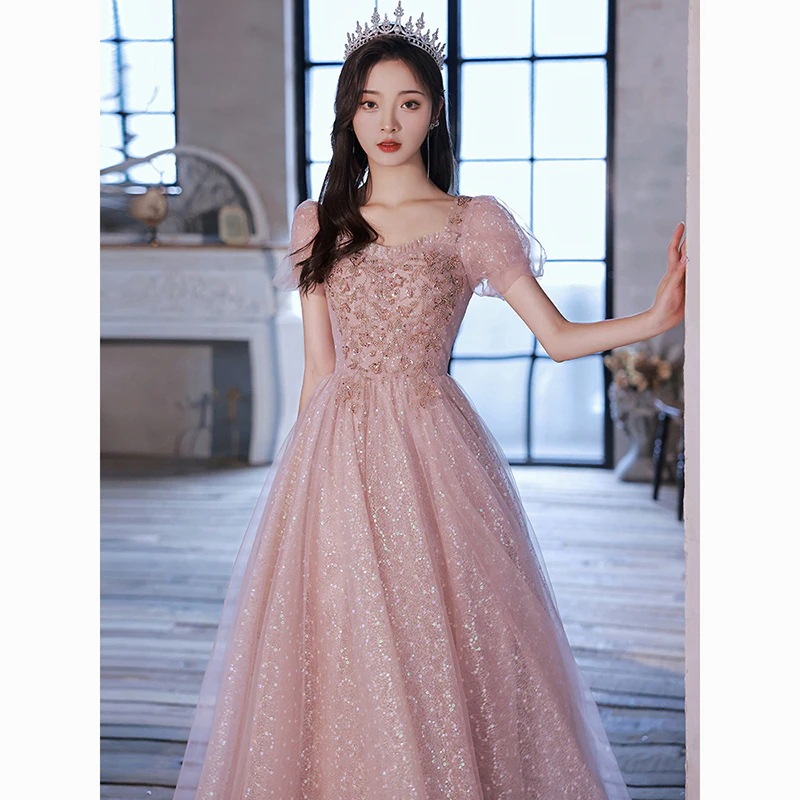 ピンクのイブニングドレス女性用宴会用上品な司会者スタイル軽奢華ニッチ高級感舞台衣装バースデードレスパーティードレス