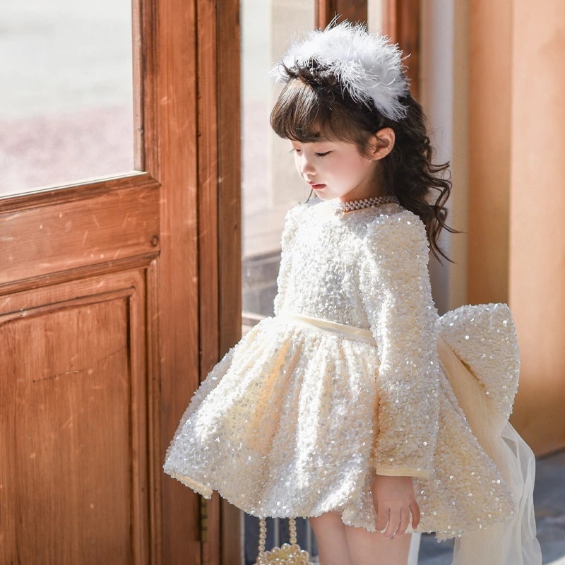 秋冬のキラキラのスカートの女の子のお姫様のスカートの重工業の小さい女の子の誕生日のスカートの蝶結びの尾のネットの小さいドレス
