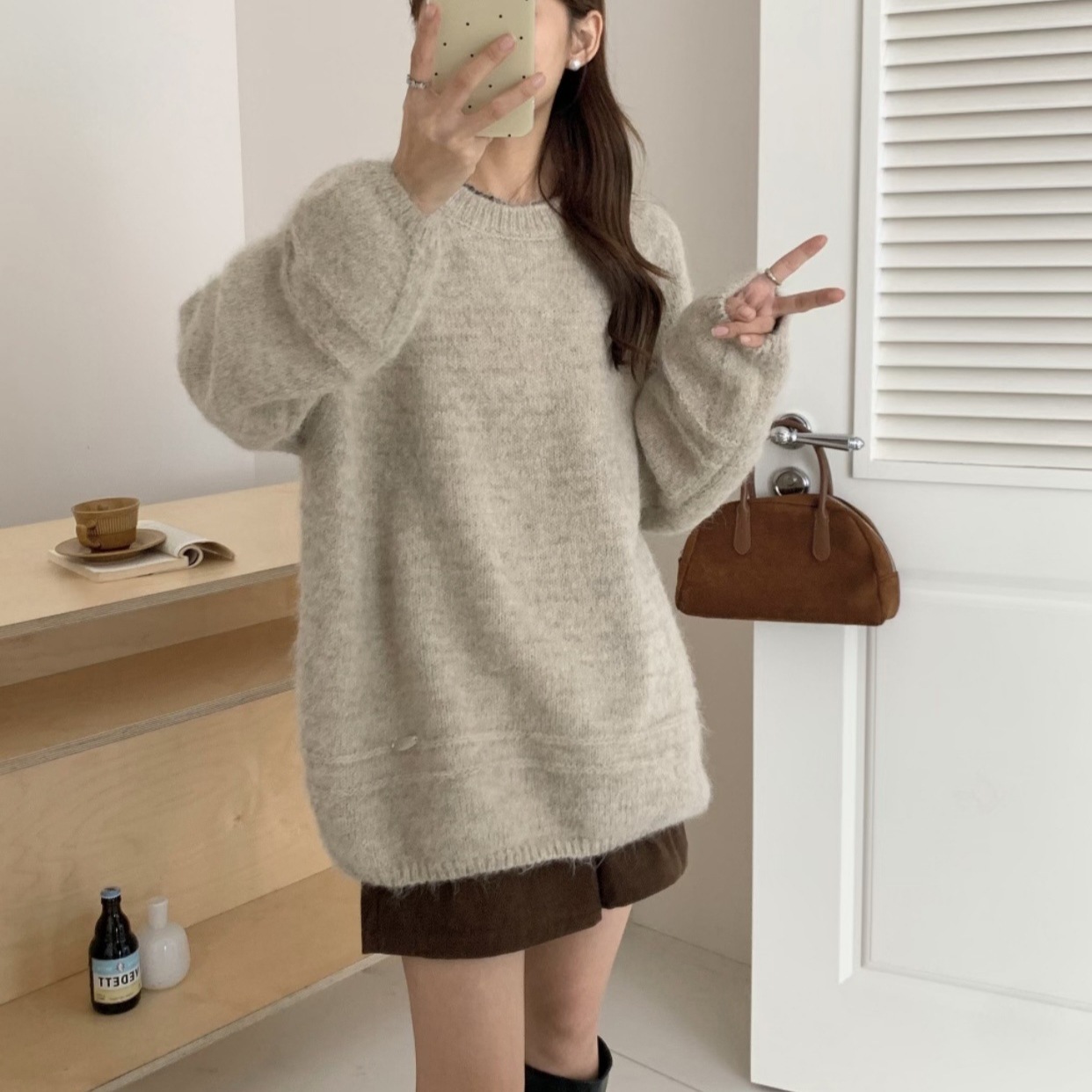 韓国風の柔らかく優しいラウンドネックのプルオーバーセーター新しい秋冬スタイルゆったりとしたゆったりとしたスタイルエレガントなニットトップス
