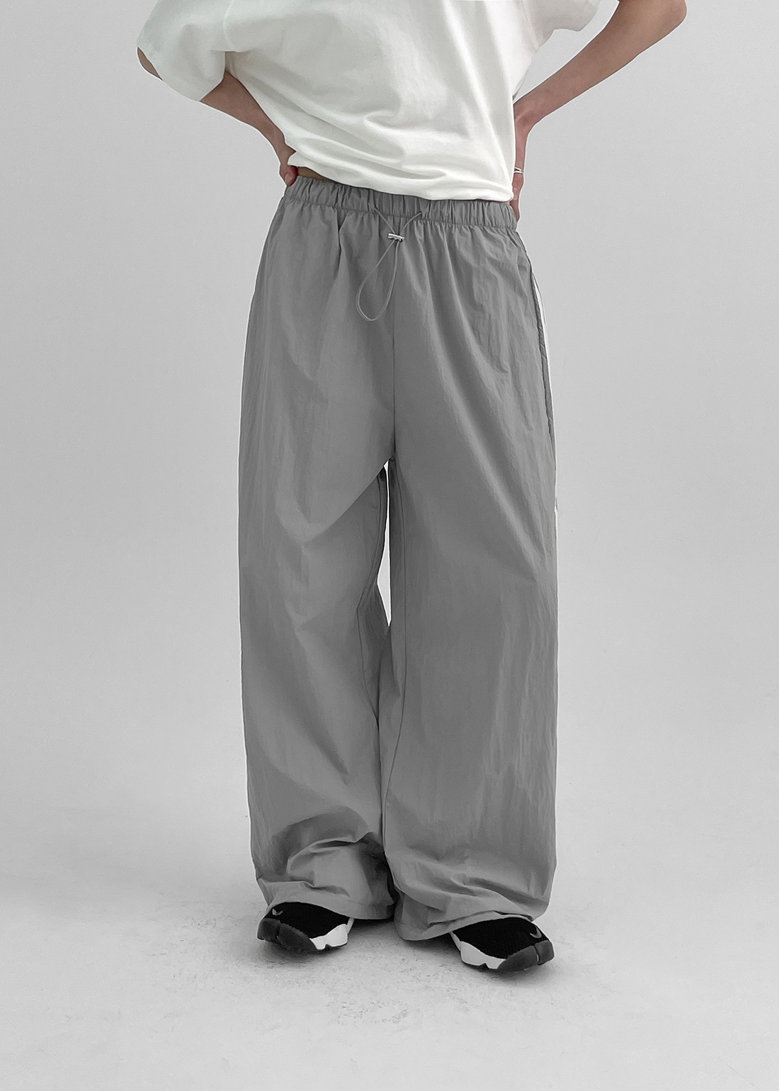 イーストラインナイロンストリングパンツ