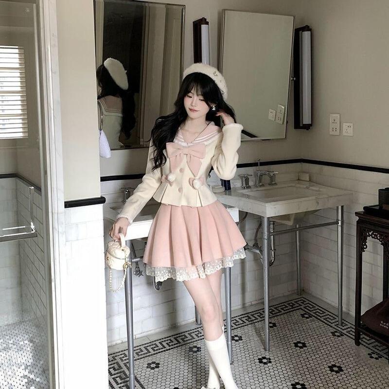秋と冬のための甘いかわいい女の子の大学の蝶の結び目の制服のトップスカートセットロールプレイングの冬のドレスの中で出荷される1日