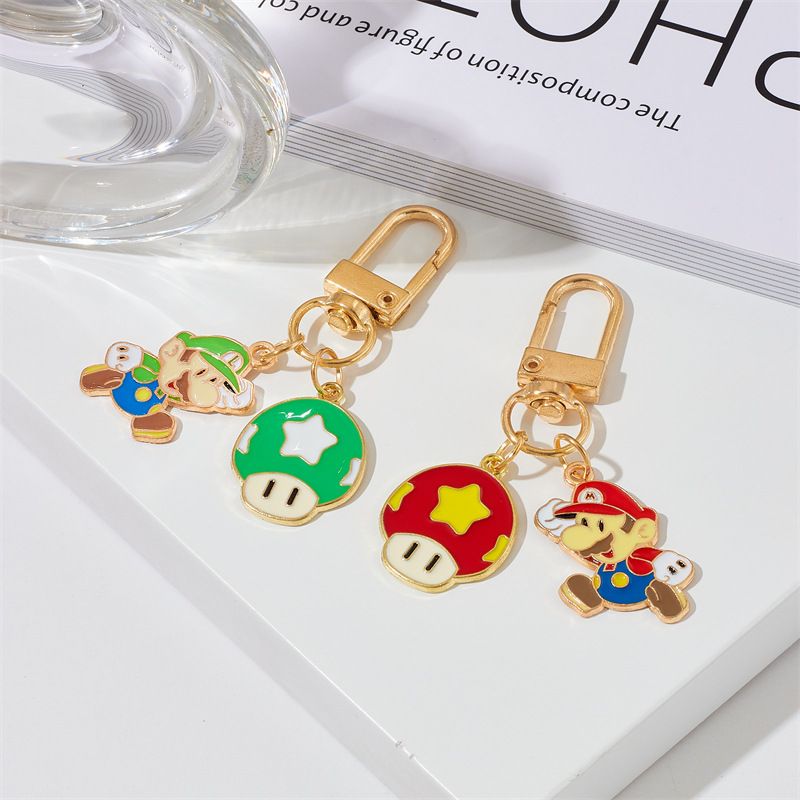 アニメかわいいマリオカップルキーホルダー男女学生自動車かばん合金キーホルダープレゼント