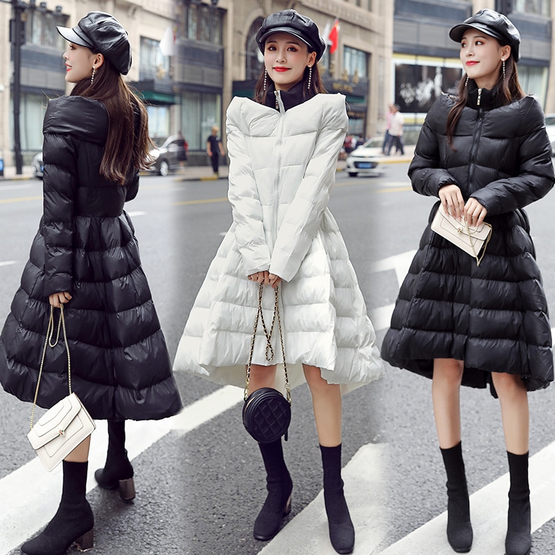 韓国2023年冬服女子A字マントダウンコットンA版ミディアムロング大振りポンポンコットンスカート裾コットンコート