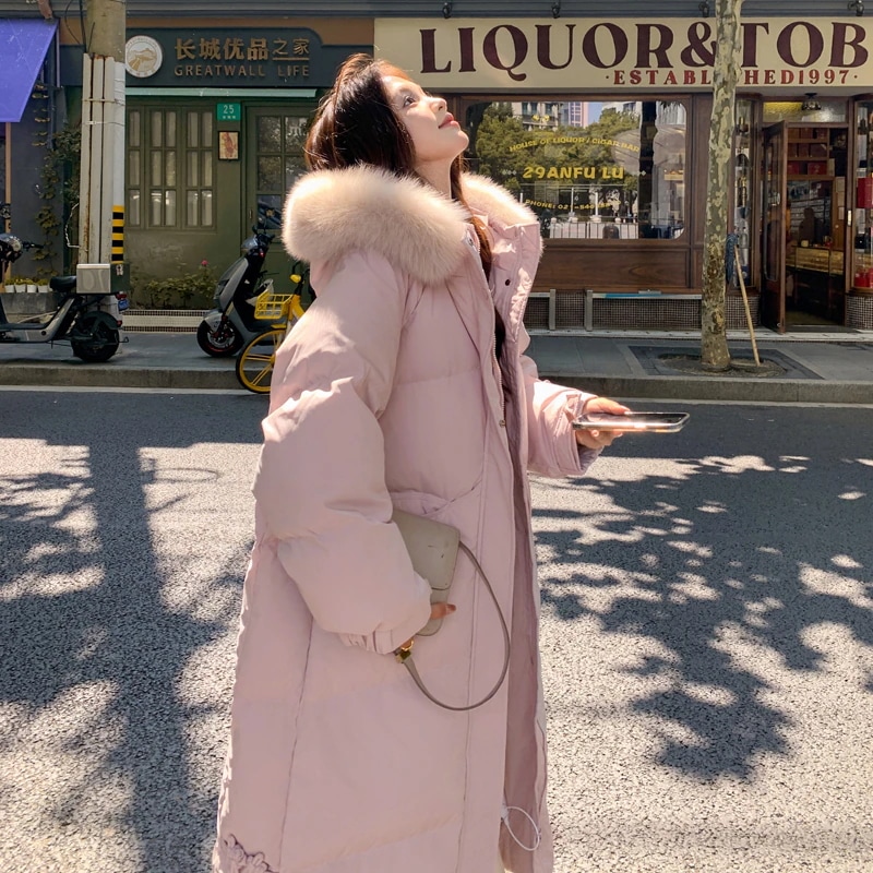 女性用ピンクロングダウンジャケット2025ファーカラー膝上厚手コート女性用今服
