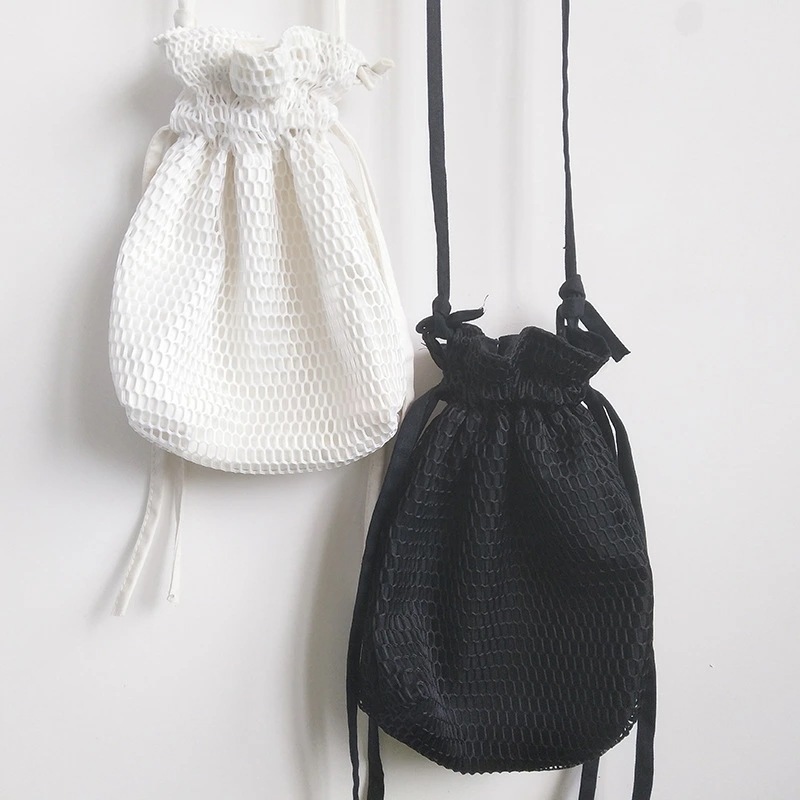 巾着バッグ 編みバッグ ショルダーバッグ レディース 2色 韓国 ファッション 雑貨 かわいい おしゃれ 北欧 送料無料 [K] (T) 5,586円