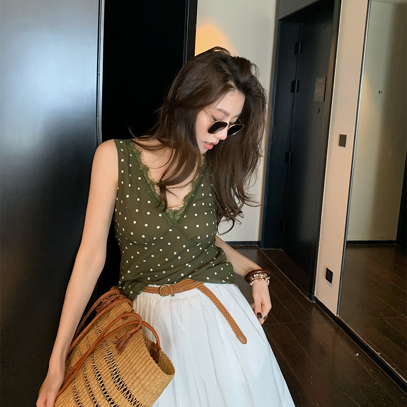 長いxierレトロハイエンドポルカドットベスト春と夏の服を着た女性のための外側に新しいスタイルを着てセクシーなvネックショートシャツを着ています