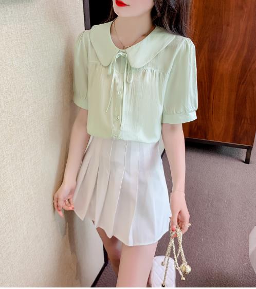 甘い人形襟シャツの女性のソリッドカラールーズワイルドトップ短いスリーブステッチシャツ