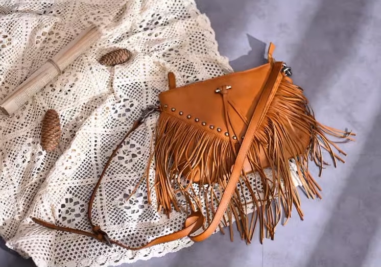 子がかりで革いるキーホルダ集配員バッグ女头がかりで黒い余りごと階斜めひきずる女バッグ気質の小さな者バッグ