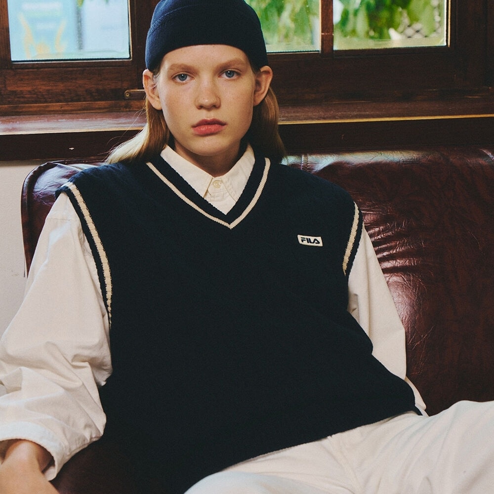 フィラヘリテージケーブルニットベスト_FE2VTE6101X_INA