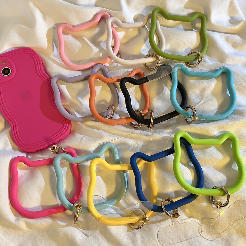 1つ買うと10個無料シリコン 猫型 ブレスレット バックル 手首 万能 携帯電話ケース ストラップ ポータブル ハンドキャリー 落下防止リング ネット 赤 かわいい レディース ストラップ 吊り下げリ