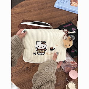 【本日限定】【大好評!】快速出荷！ハローキティ化粧バッグ女性コーデュロイポータブル外出大容量かわいい洗面バッグ化粧品収納バッグ