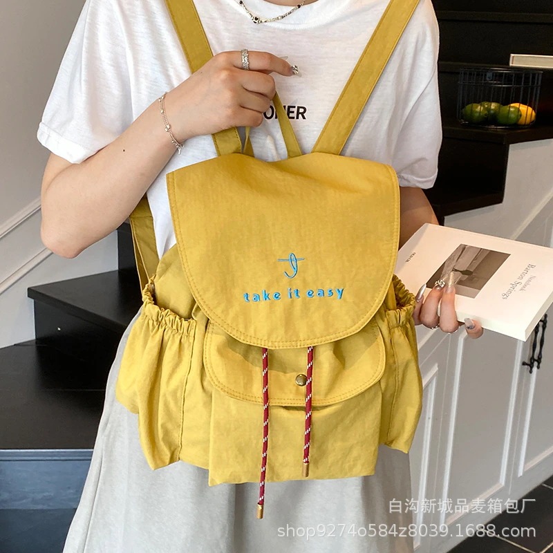 【超お得1つ買うと10個もらえる】メガ割ナップサック 軽量旅行ショルダーバッグ女性新しい大容量キャンバス学生ランドセル