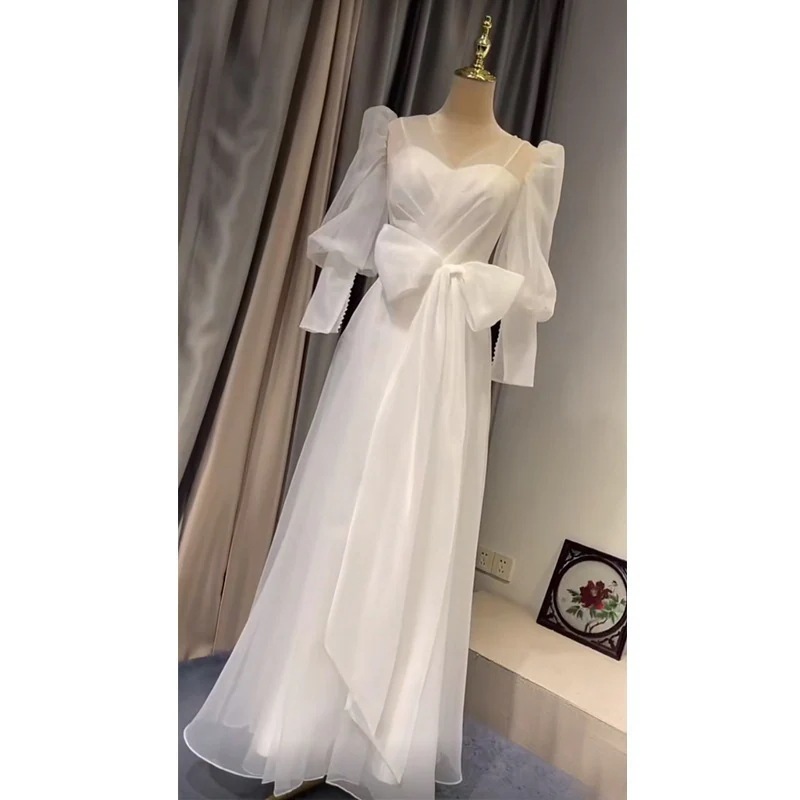 フランス式の軽いウェディングドレスの春の新型の新婦は結婚して簡単です