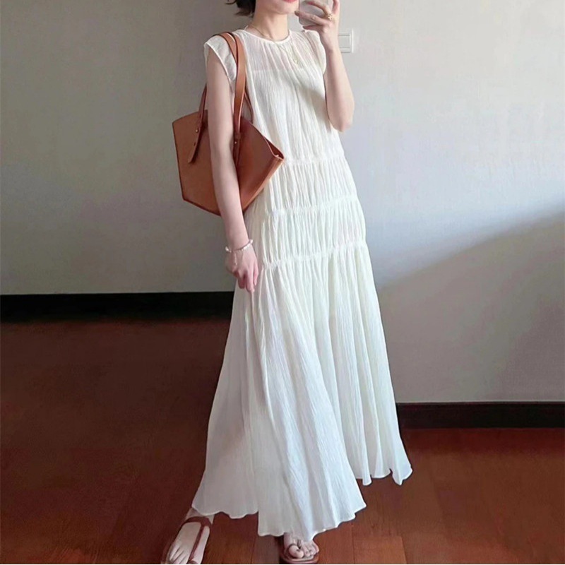 フランス式の優しいしわ筋理感仙気小飛袖ワンピース女性夏の新型怠惰風ゆるいロングスカート