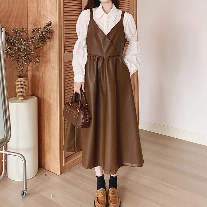 レディース ジャンパースカート 膝下 ミモレ ロング 袖なし ノースリーブ フレア Aライン ハイウエスト フェイクレザー かわいい 大人可愛い シンプル カジュアル 上品 おしゃれ こなれ感 無地