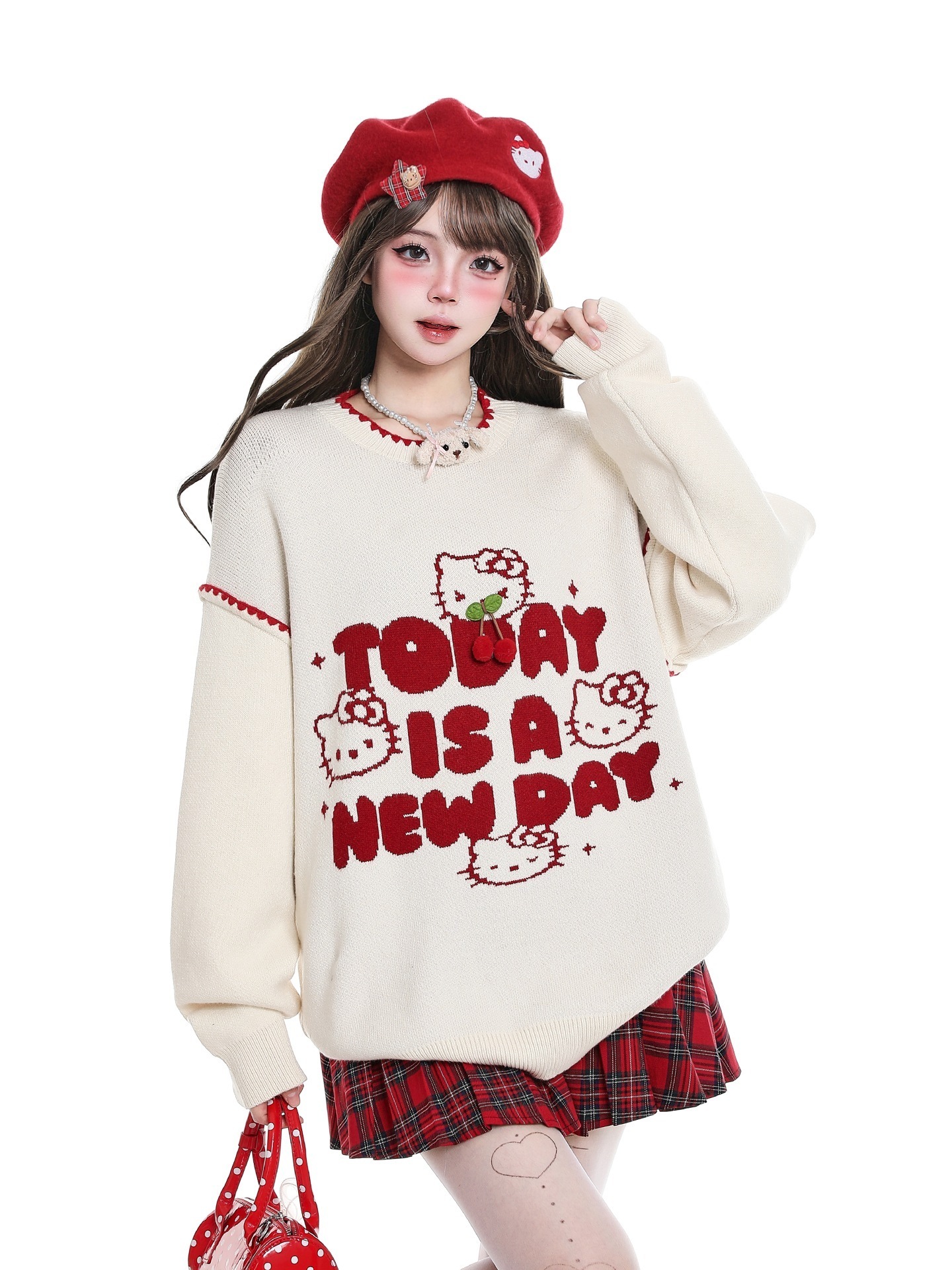甘美でかわいい趣味のkitty猫がセーターを着ている女性秋の韓系は怠惰なカジュアルなニットを着ている
