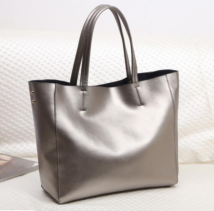 本物の革のハンドバッグ2020新しい流行の女性のシンプルな牛革ポータブルメッセンジャーショルダーバッグ