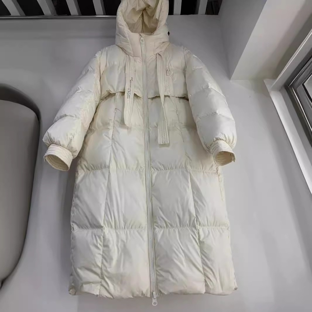 韓国風の高品質の厚手のホワイトダックダウン掛け布団女性用の新しい冬用ダウンジャケットロング丈の膝上コートトレンド感満載