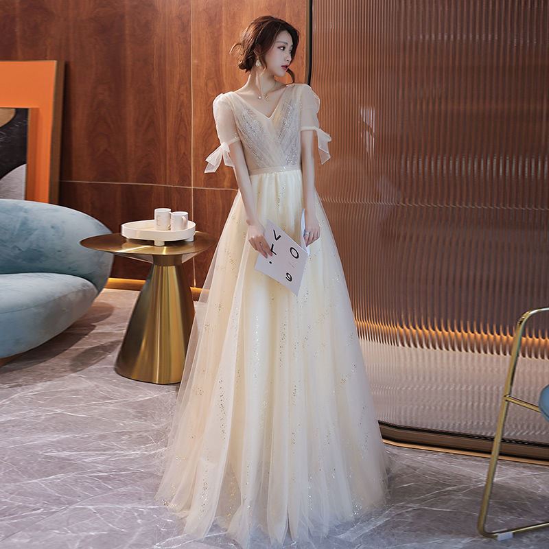 シャンパン色イブニングドレス女2025長優雅な雰囲気で腰を収めて痩せて見える学生卒業パーティードレス