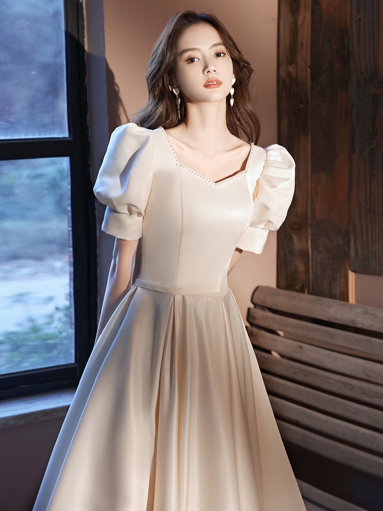 ドレスドレス/バンケットイブニングドレス 2023 新しいライトシャンパンサテンパフスリーブロングスカートホストアートテストコーラスドレススカートカスタマイズされた支払い支払い後の返金または交換不可