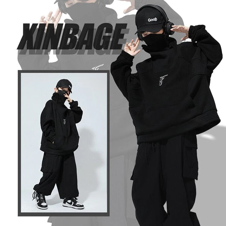 ストリートダンスの子供のファッション服の子供たちはヒップホップ風の子供服のファッションブランドの男の子のクールでかっこいいhiphopスーツを着ています