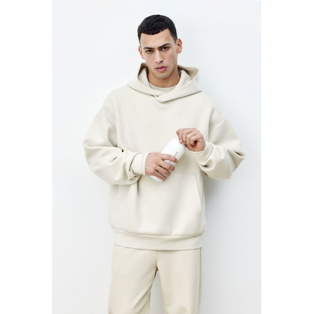 H&M スポーツフーディールーズフィットドライムーブライトベージュ